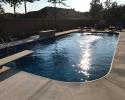 Quite a site for this finished pool install with the diving board