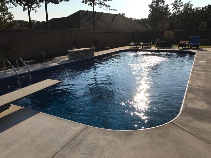 Quite a site for this finished pool install with the diving board