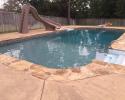 This pool adds a beautiful feature to this backyard.