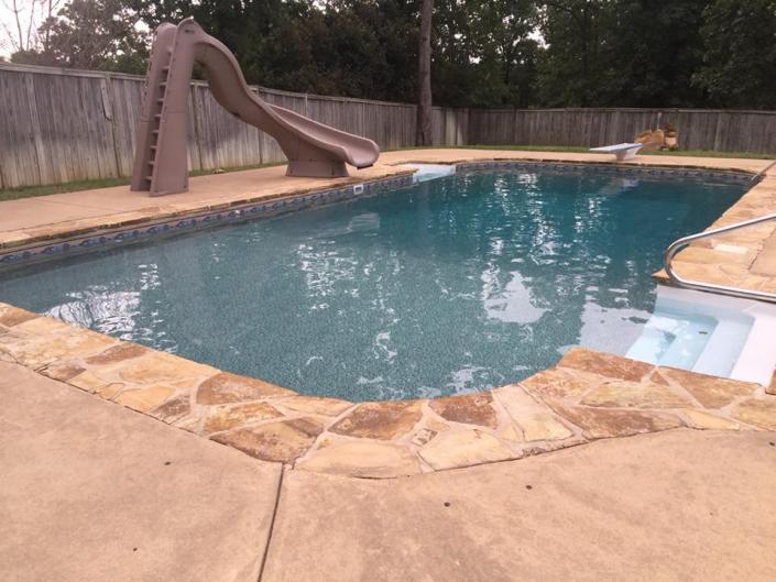 This pool adds a beautiful feature to this backyard.